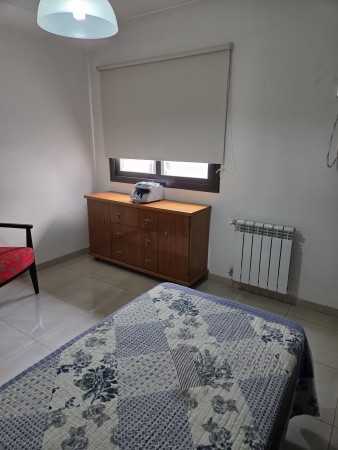 VENTA DPTO 2 DORMITORIOS, 2 BAÑOS, COCHERA, FRENTE CON BALCON, VILLA CARLOS PAZ.
