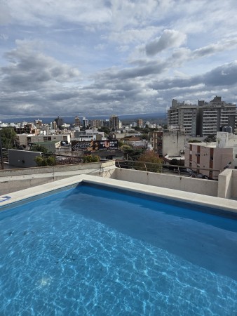 VENTA DPTO 2 DORMITORIOS, 2 BAÑOS, COCHERA, FRENTE CON BALCON, VILLA CARLOS PAZ.