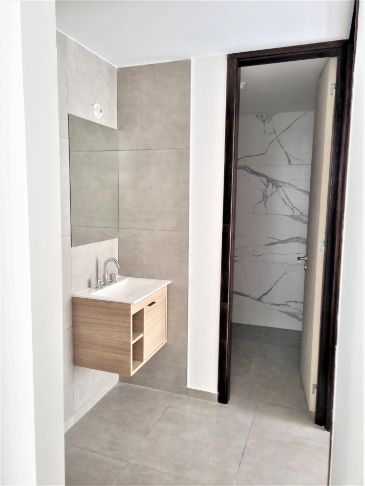 VENTA DPTO DE 1 DORMITORIO Y COCHERA EN PASEO NAMBA CARLOS PAZ 