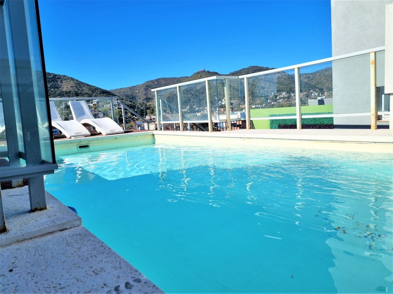 VENTA DPTO 2 DORMITORIOS, 2 BAÑOS, FRENTE CON BALCON TERRAZA Y COCHERA EN CENTRO CARLOS PAZ