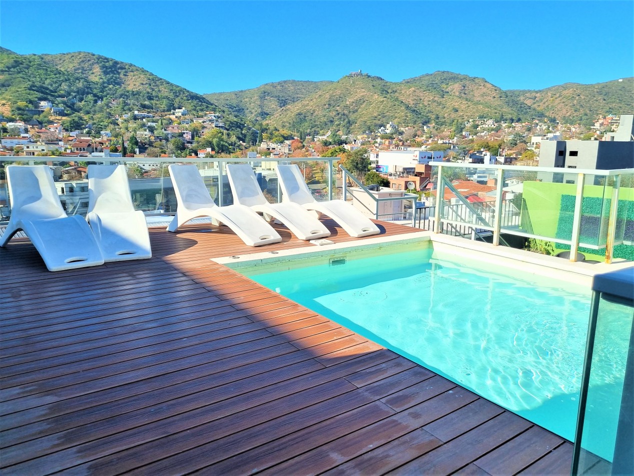 VENTA DPTO 2 DORMITORIOS, 2 BAÑOS, FRENTE CON BALCON TERRAZA Y COCHERA EN CENTRO CARLOS PAZ