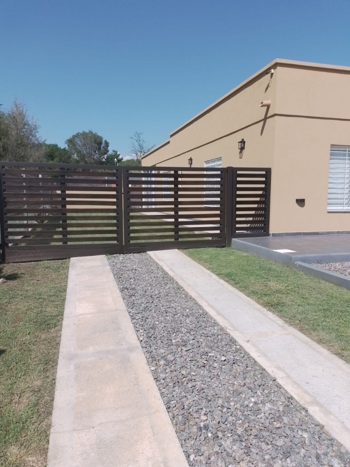 VENTA CASA EN BARRIO CERRADO ALTOS DE CARLOS PAZ