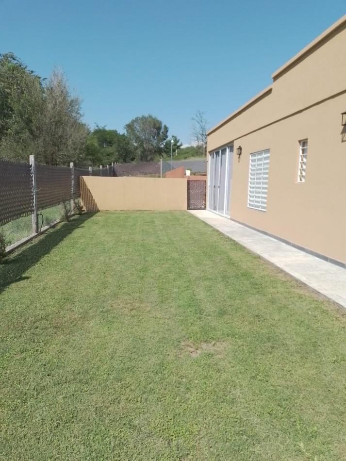 VENTA CASA EN BARRIO CERRADO ALTOS DE CARLOS PAZ