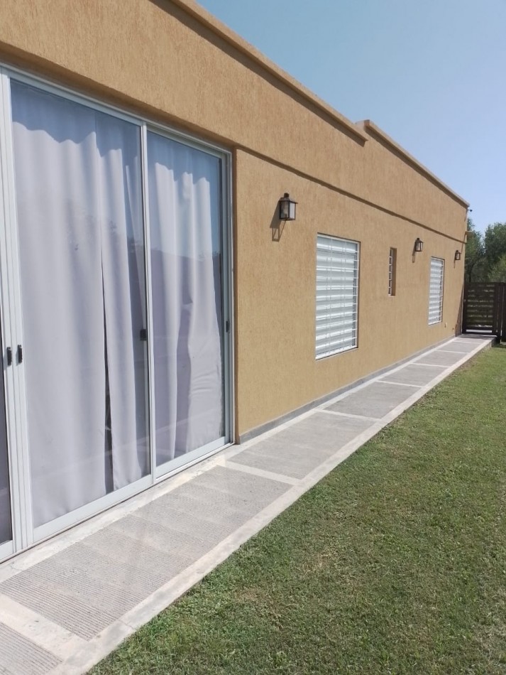 VENTA CASA EN BARRIO CERRADO ALTOS DE CARLOS PAZ
