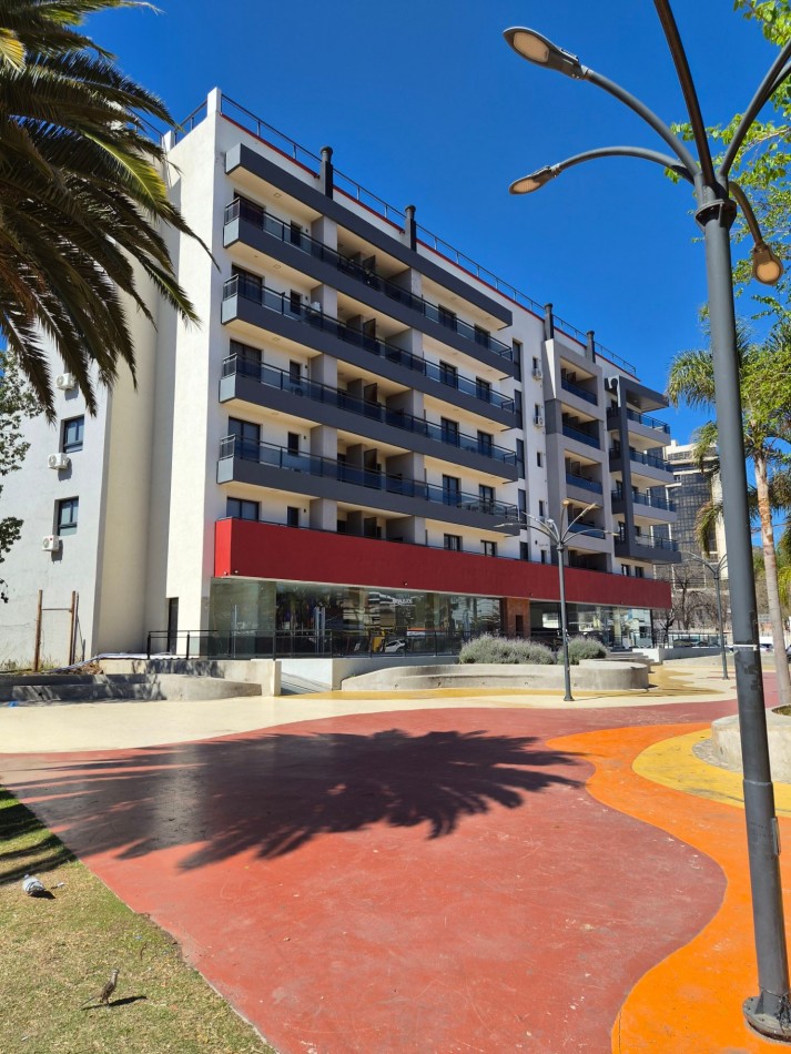 VENTA DPTO 1 DORMITORIO Y COCHERA CENTRO CARLOS PAZ TOTALMENTE AMOBLADO