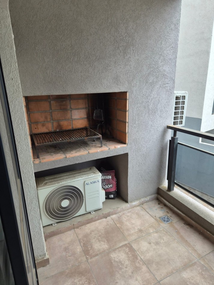 VENTA DPTO 1 DORMITORIO Y COCHERA CENTRO CARLOS PAZ TOTALMENTE AMOBLADO
