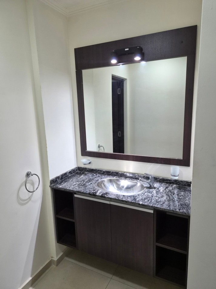 VENTA DPTO 1 DORMITORIO Y COCHERA CENTRO CARLOS PAZ TOTALMENTE AMOBLADO