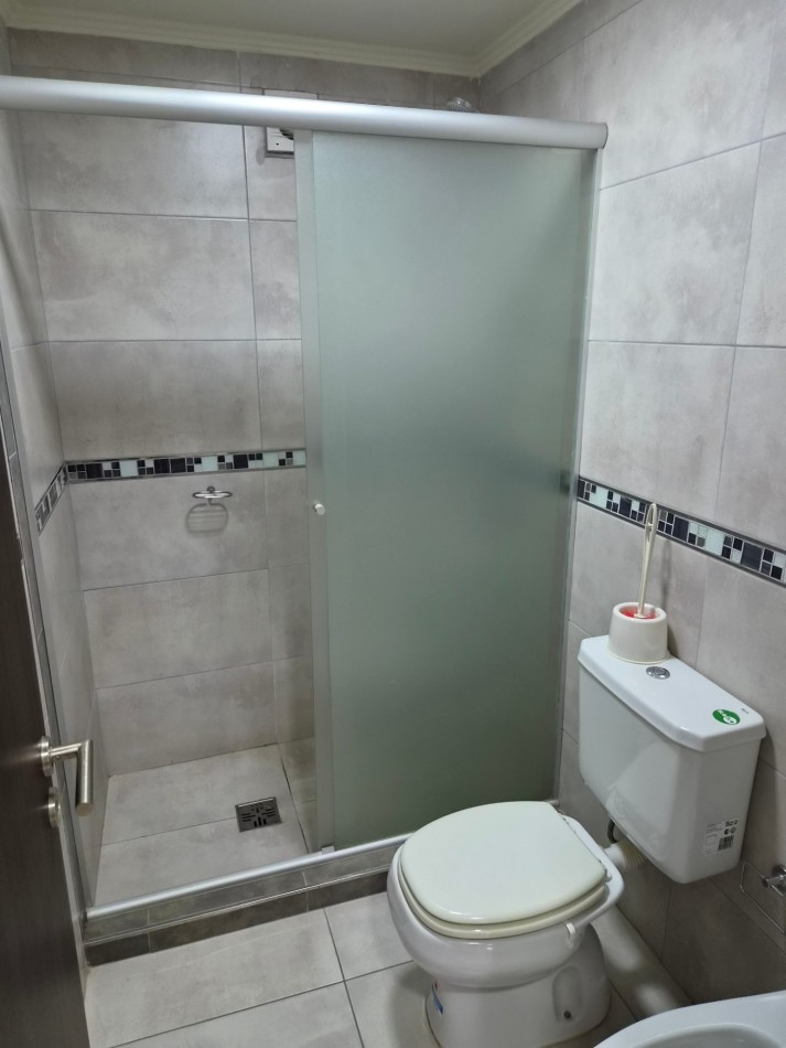 VENTA DPTO 1 DORMITORIO Y COCHERA CENTRO CARLOS PAZ TOTALMENTE AMOBLADO