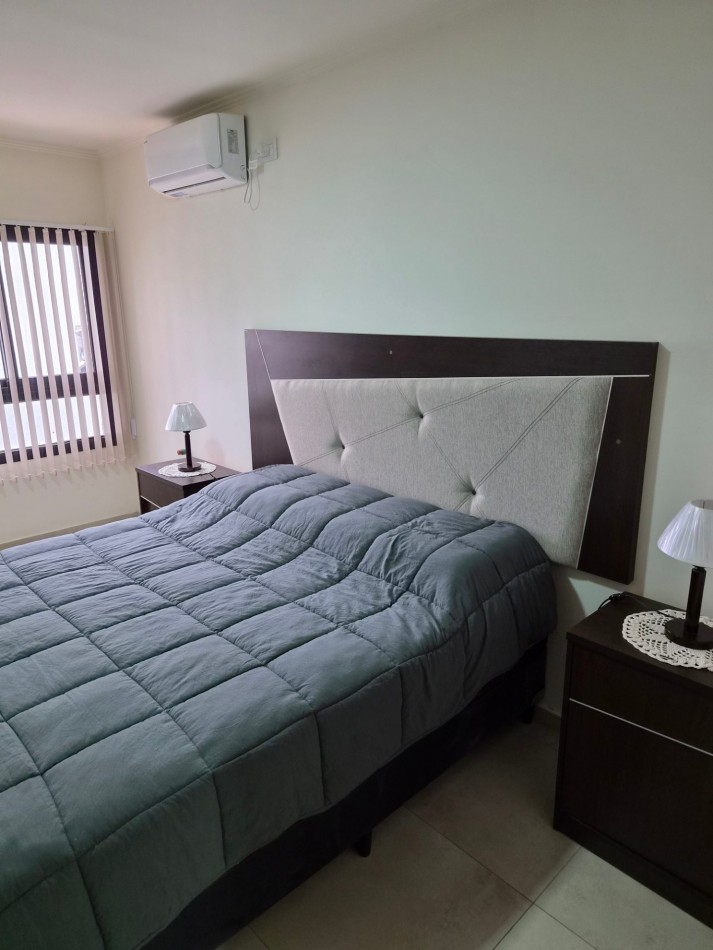 VENTA DPTO 1 DORMITORIO Y COCHERA CENTRO CARLOS PAZ TOTALMENTE AMOBLADO