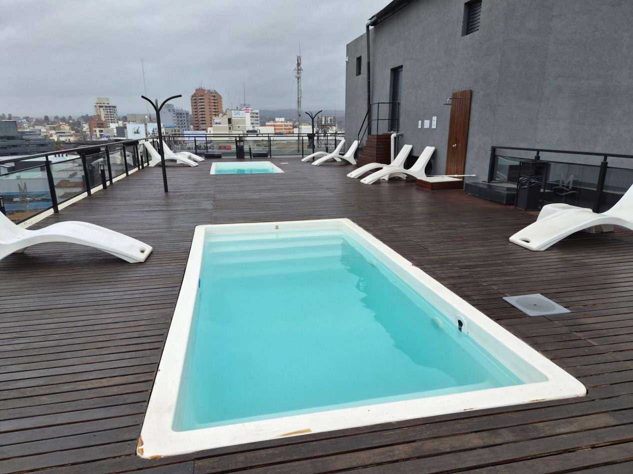 VENTA DPTO 1 DORMITORIO Y COCHERA CENTRO CARLOS PAZ TOTALMENTE AMOBLADO